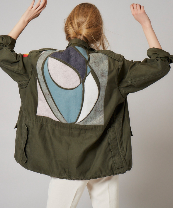 Customised vintage military khaki parka jacket with appliqued ovals and arcs in wool across back.