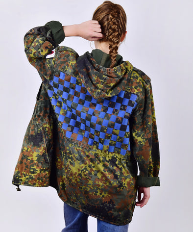 Customised vintage camo parka jacket with blue weave across the back. 