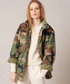 Customised vintage camo parka jacket with wool and sequin design on back
