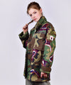 Customised vintage camo military jacket with coloured sequins